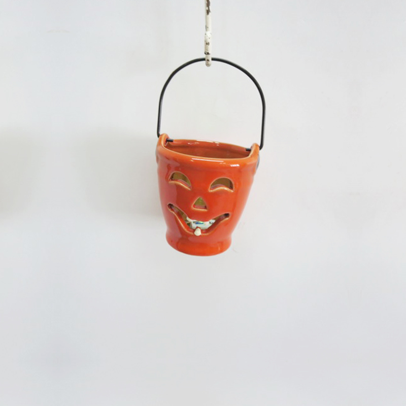 Tragbarer K&uuml;rbis-Kerzenhalter aus Keramik