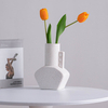 Zeitlose weiße Porzellanvase - vielseitiges Blumenstück für jeden Raum