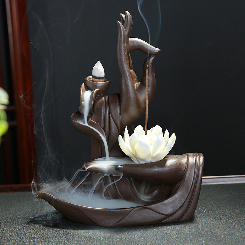 Keramische Buddhas-Hand, die Blumen-Wasserfall-Backflow-Räucherbrenner hält