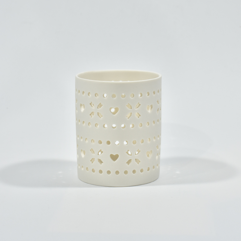 Weißes Porzellan kreisförmiger Hohlkerzenbecher Keramik Hohlausmuster Teelicht Kerzenhalter