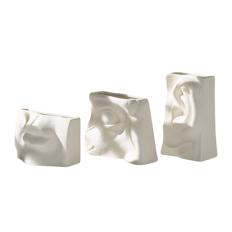 Auge, Ohr, Mund, Nasenstil Design Keramikvase Porzellan hergestellt Blumenvase