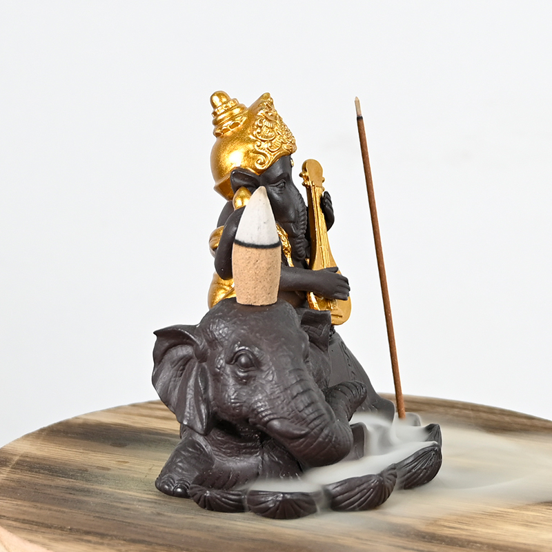 Keramik-Ganesha sitzt auf dem Elefanten-Wasserfall Backflow-Räucherstäbchen-Kegel-Keramik-Backflow-Räucherbrenner